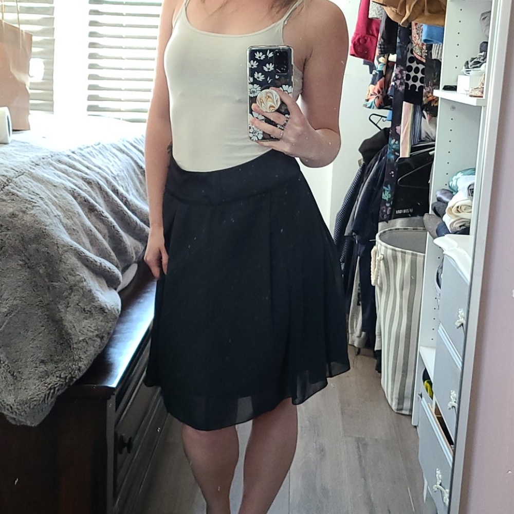 2/$20 Black flowy mini skirt - Picture 2 of 2